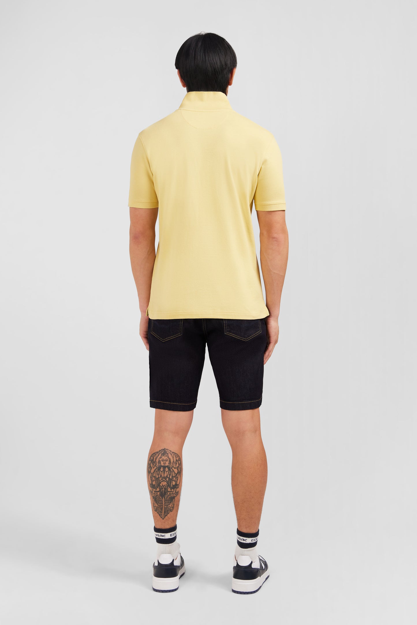 Plain yellow short-sleeved polo shirt