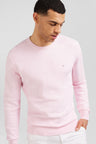 Pink jumper in decorative cable knit
