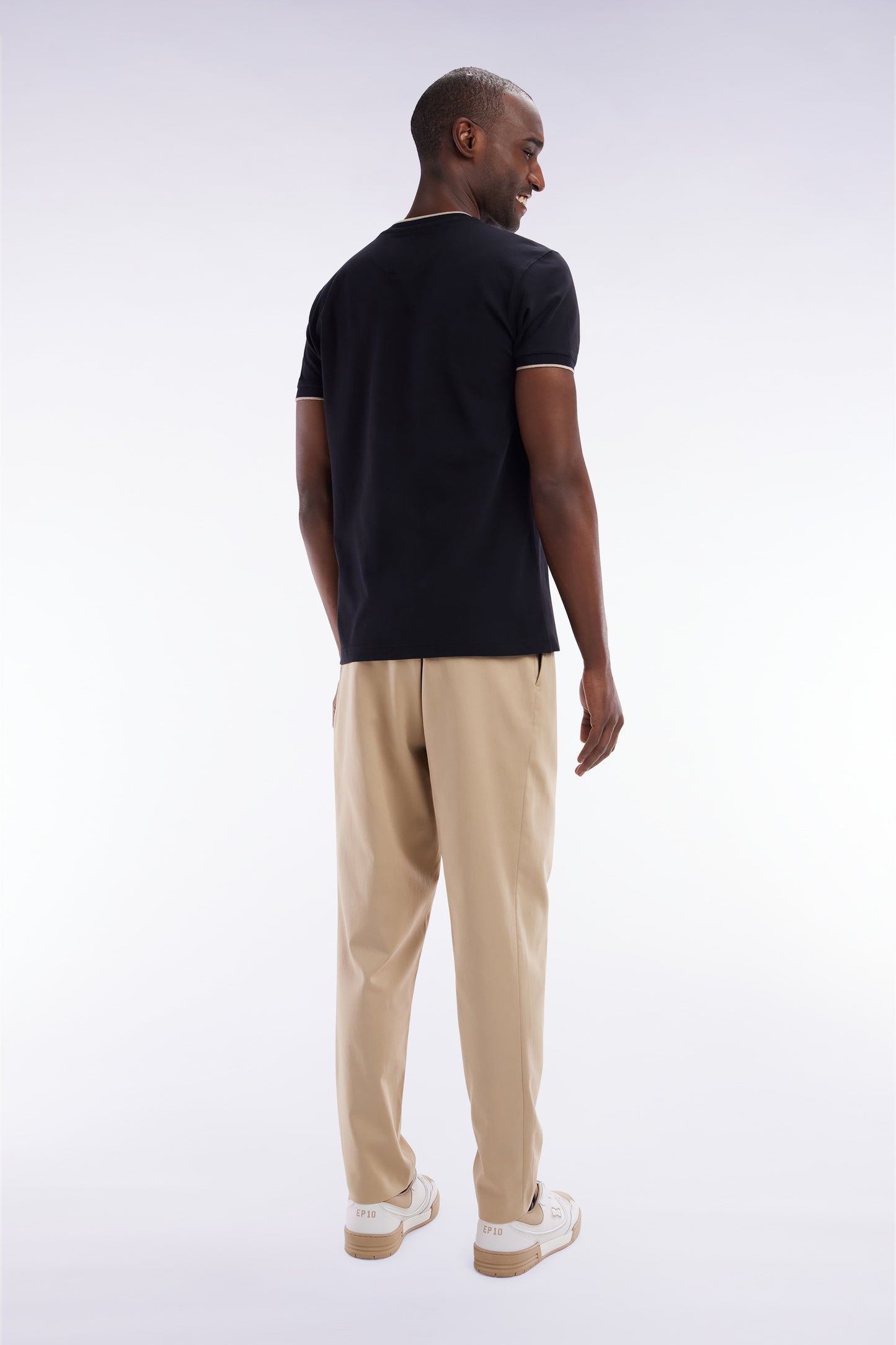 Elastic trousers in beige lyocell and stretch cotton