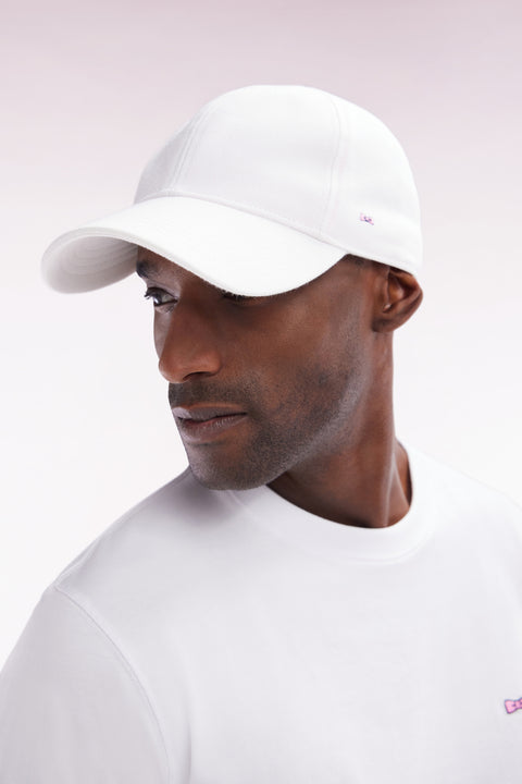 White cotton piqué cap with bow tie embroidery - Image 1