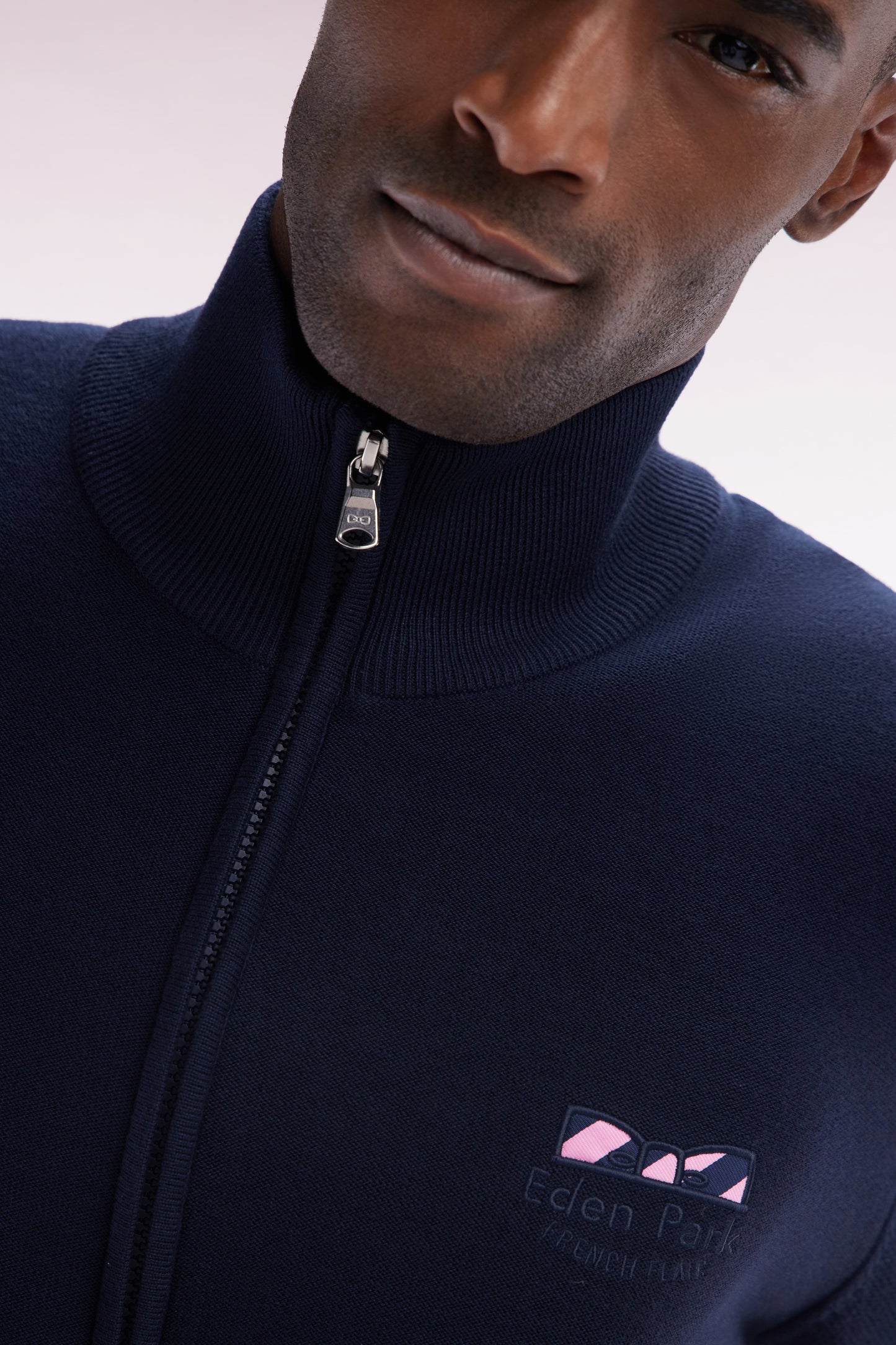 Straight zipped navy cotton cardigan with striped bow tie embroidery