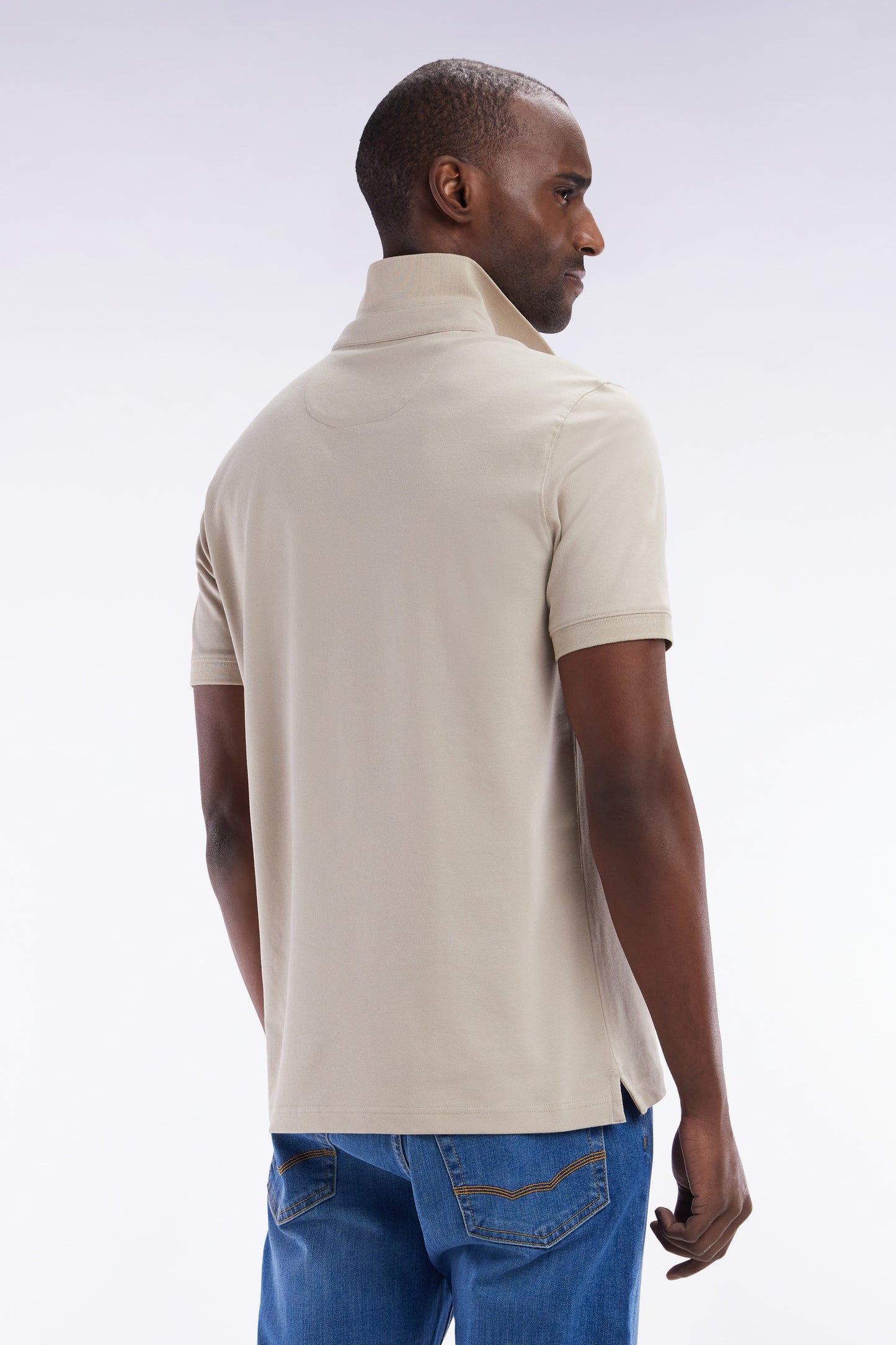 Slim-fit short-sleeved polo shirt in beige cotton piqué