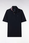 Straight-cut short-sleeved polo shirt in navy blue Pima cotton piqué with striped under collar