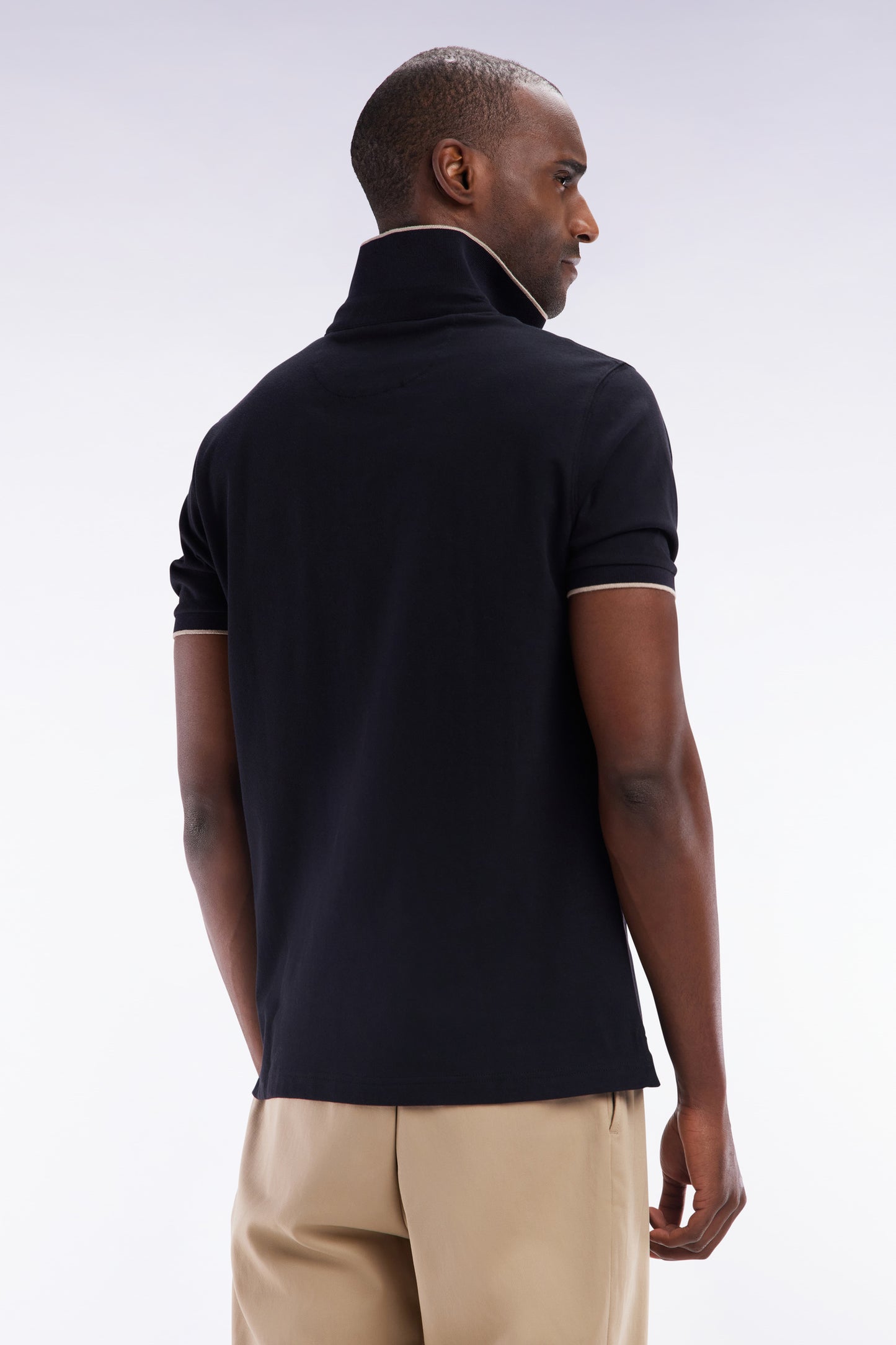Slim-fit short-sleeved polo shirt in black stretch cotton piqué