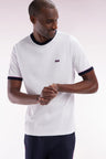 Straight-fit white cotton T-shirt with embroidery and bow tie badge