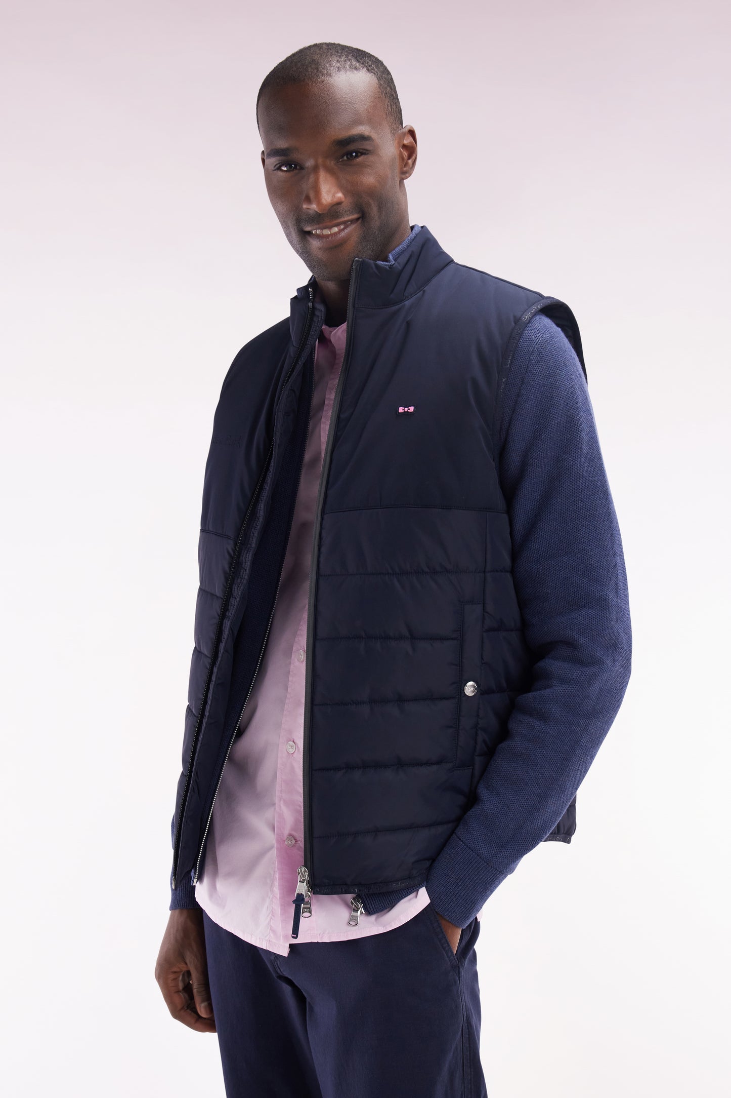 Navy bi-material sleeveless down jacket