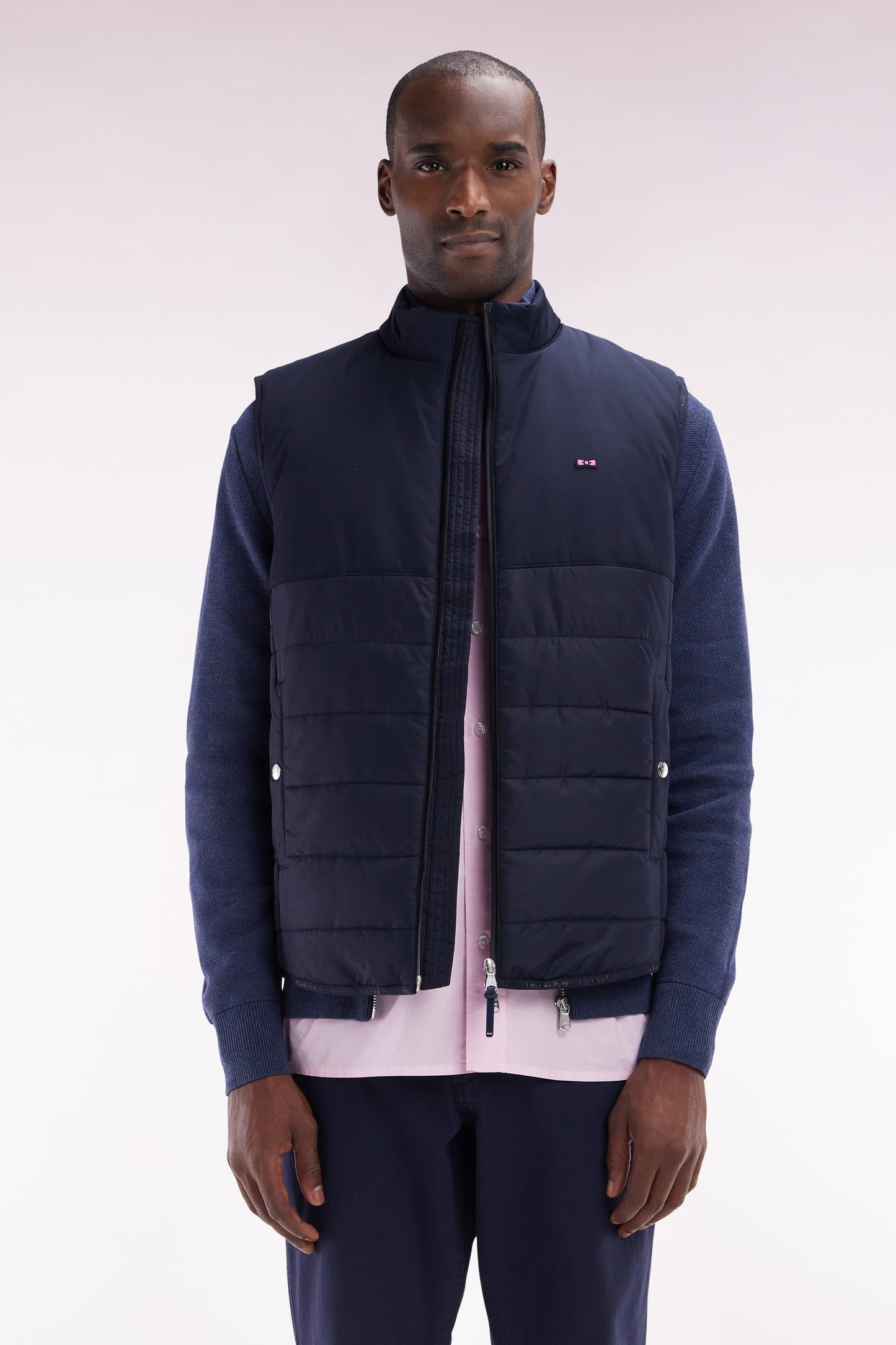 Navy bi-material sleeveless down jacket