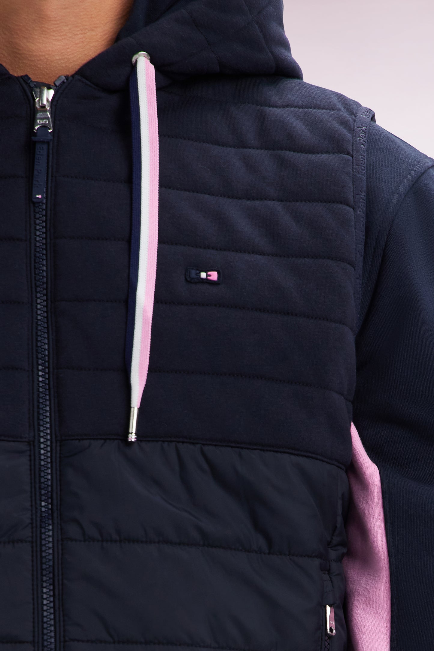 Sleeveless navy bimaterial down jacket with hood