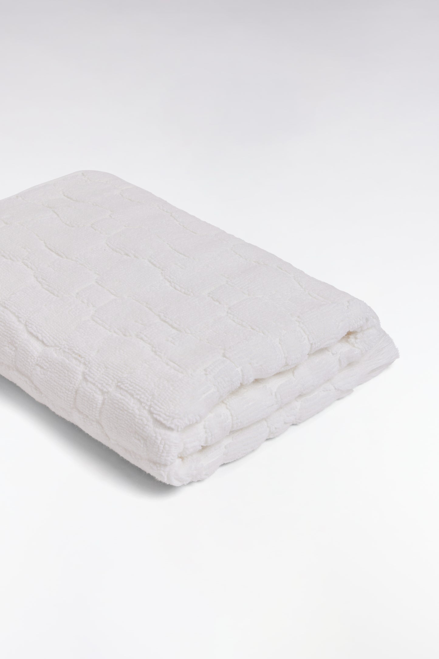 Serviette de toilette en coton blanc à micromotifs nœuds papillon