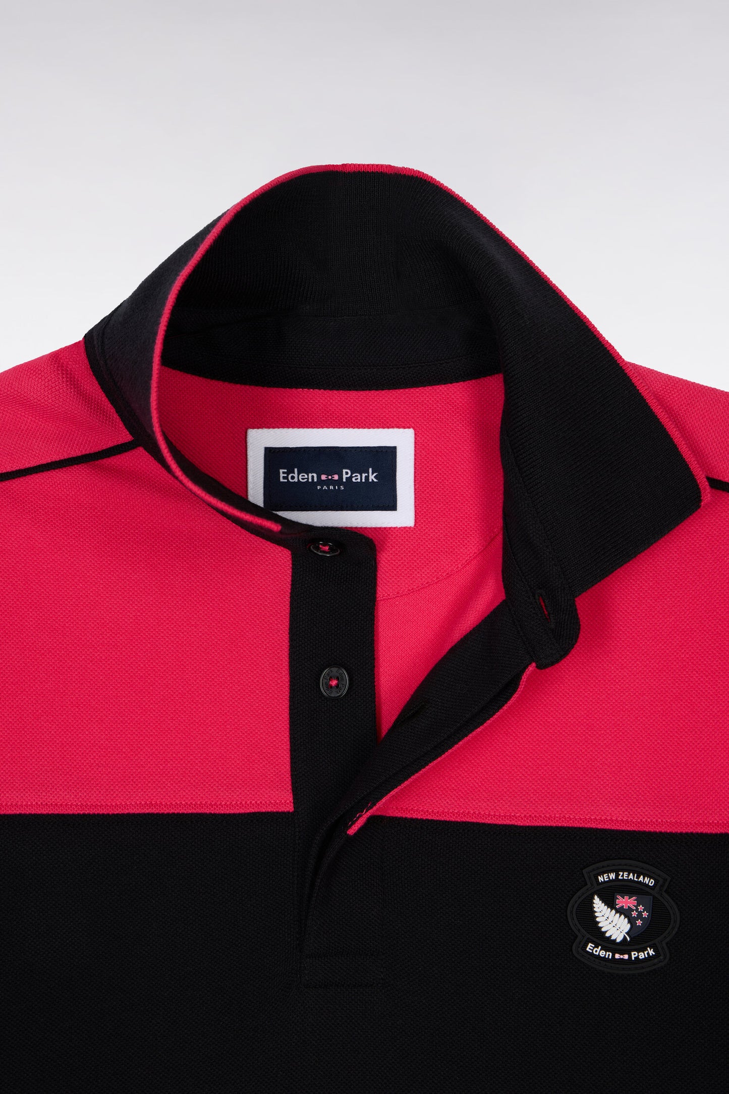 Polo à manches courtes en coton fuchsia et noir New Zealand coupe regular