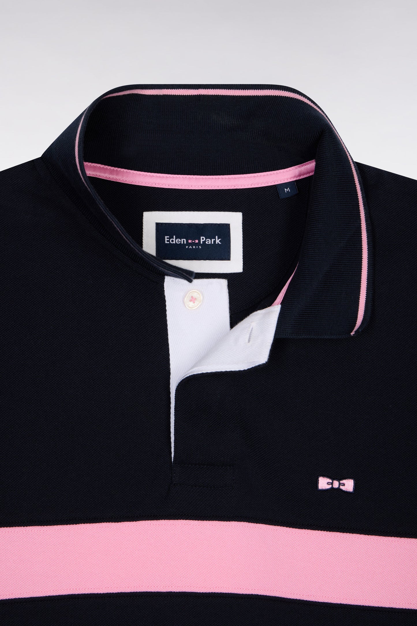 Polo à manches courtes en piqué coton marine à rayures coupé cousu