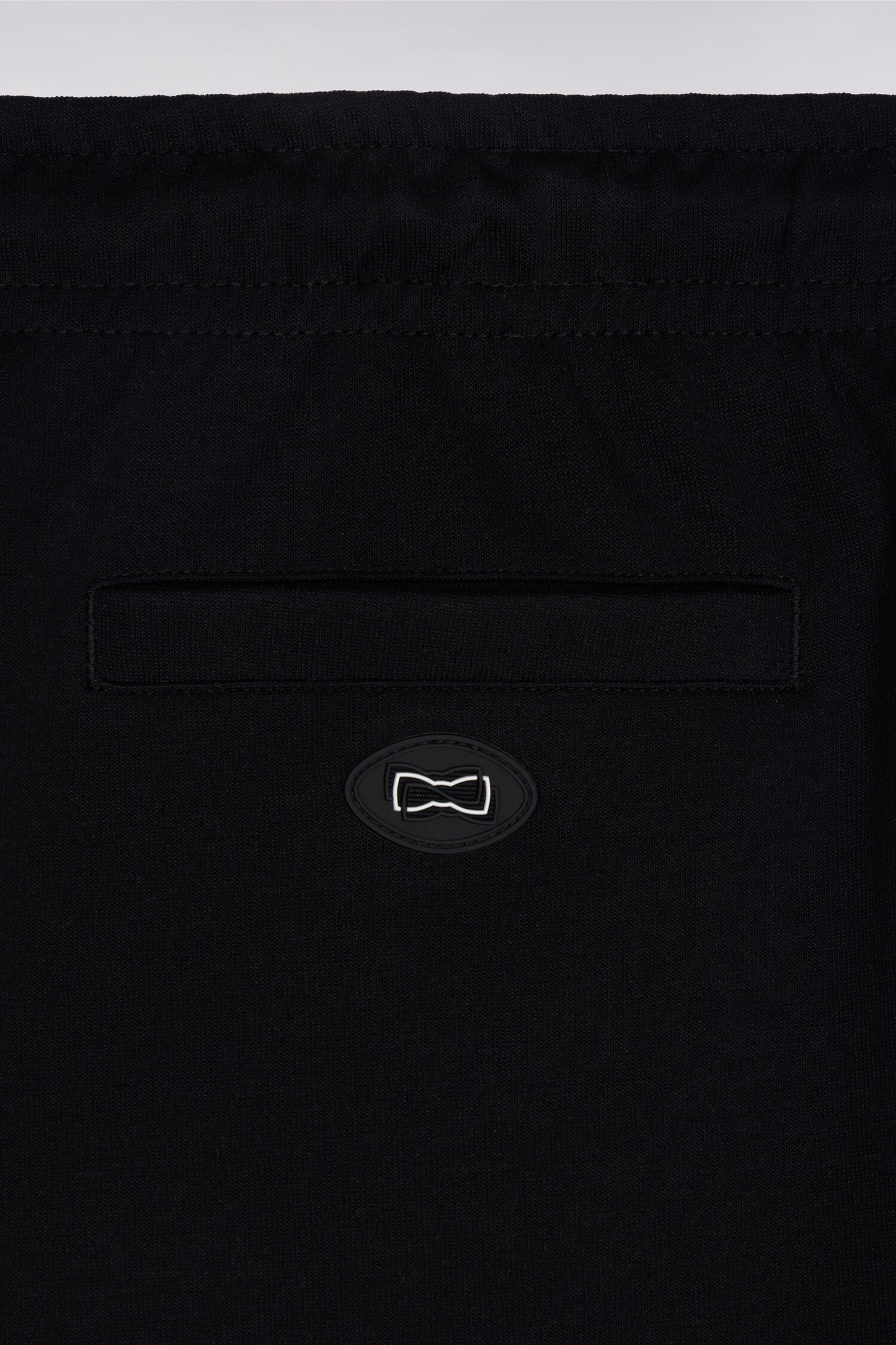 Black fleece shorts with white piping