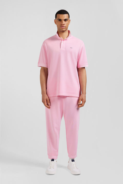 Oversized pink unisex short-sleeved cotton piqué polo shirt - Image 1