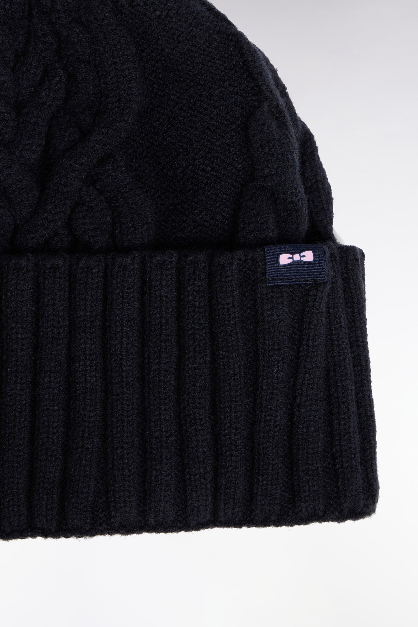 Bonnet en maille torsadé marine