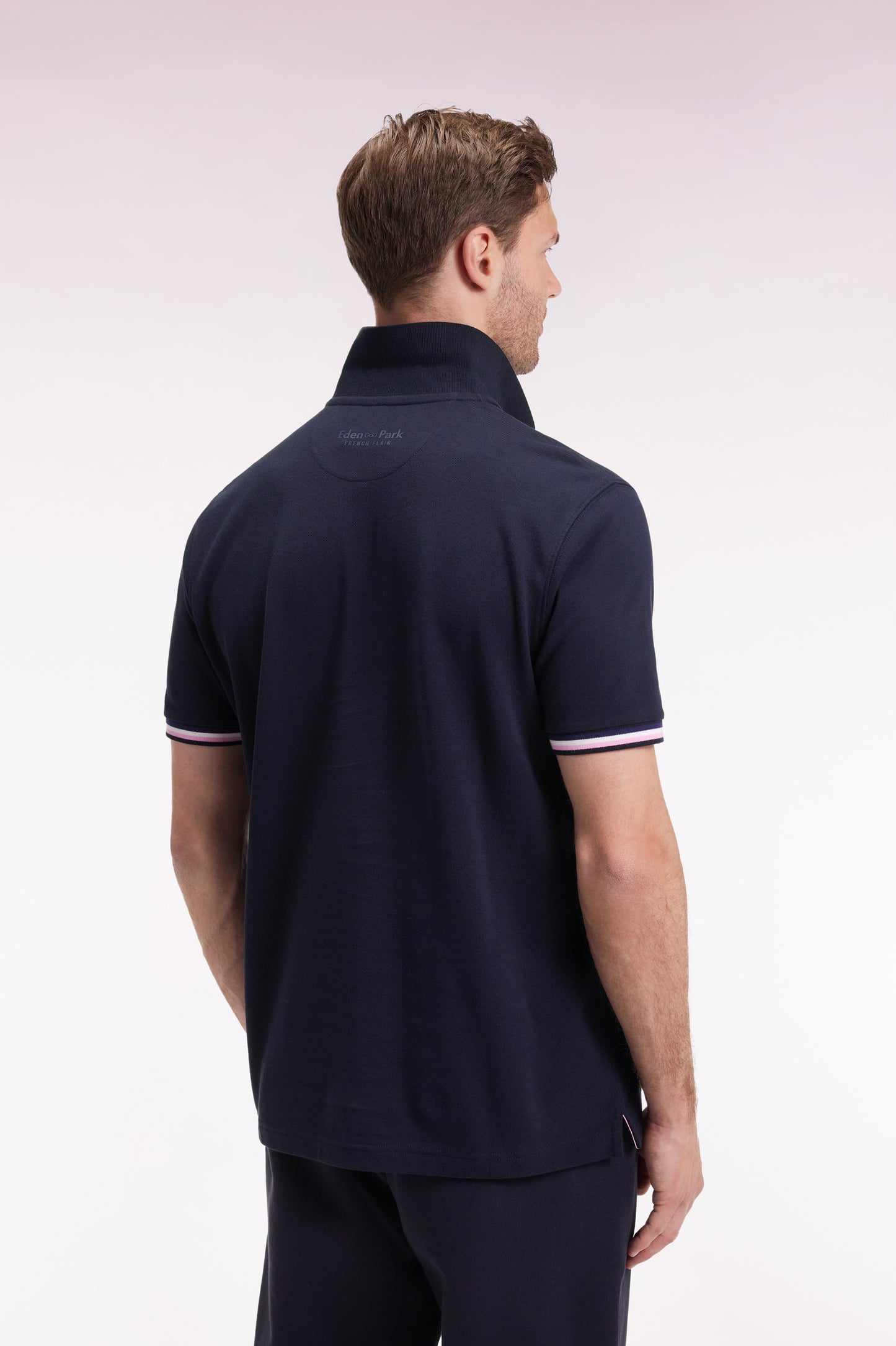 Polo manches courtes en coton marine détails rayés coupe ample