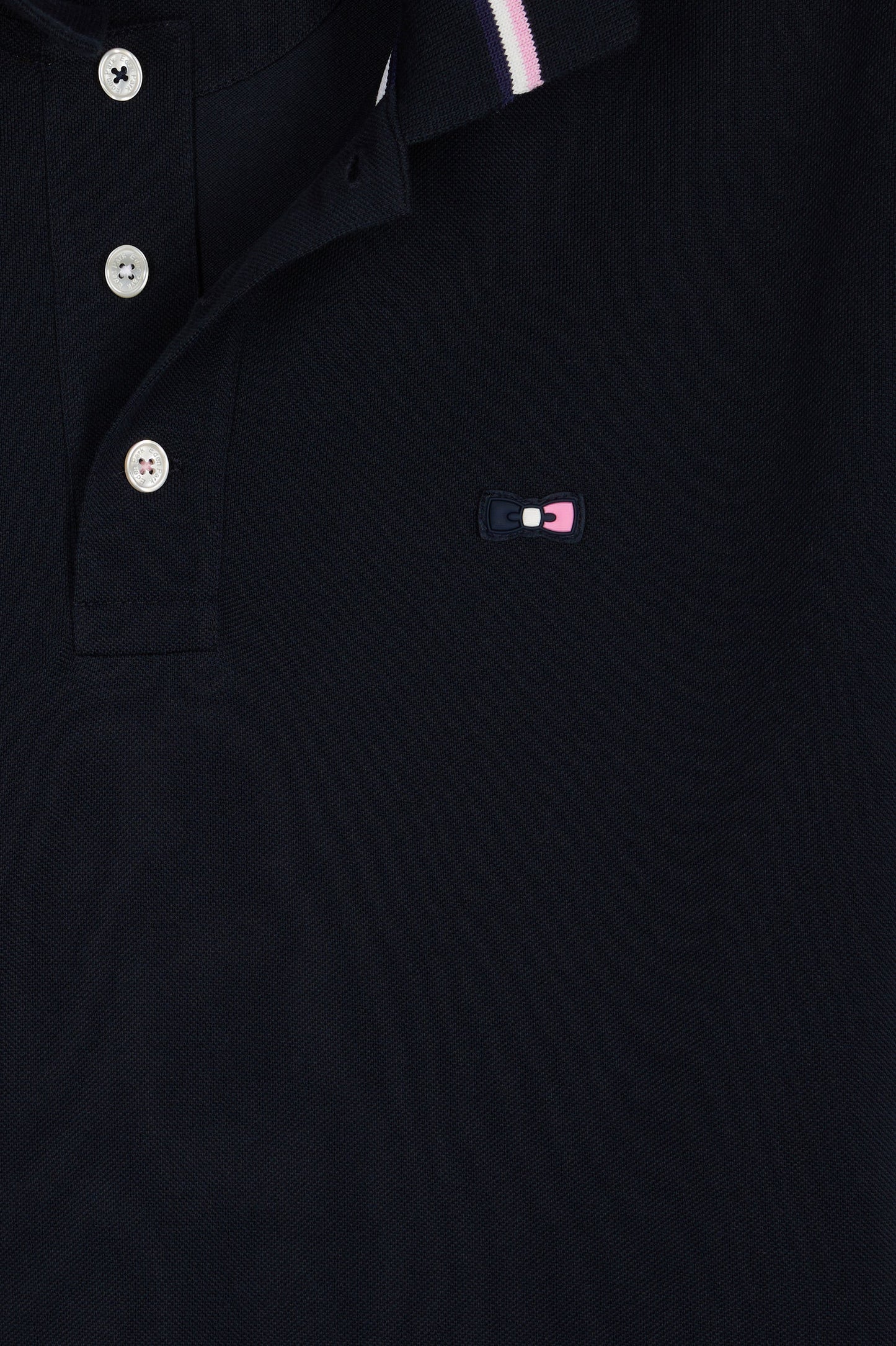 Polo manches courtes en coton marine détails rayés coupe ample