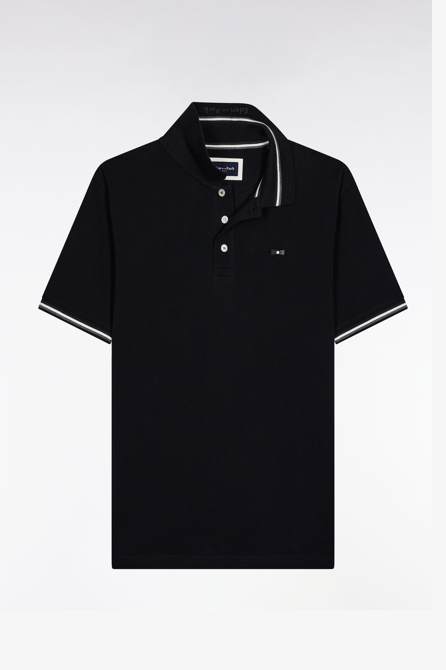 Polo manches courtes en coton noir détails rayés coupe ample