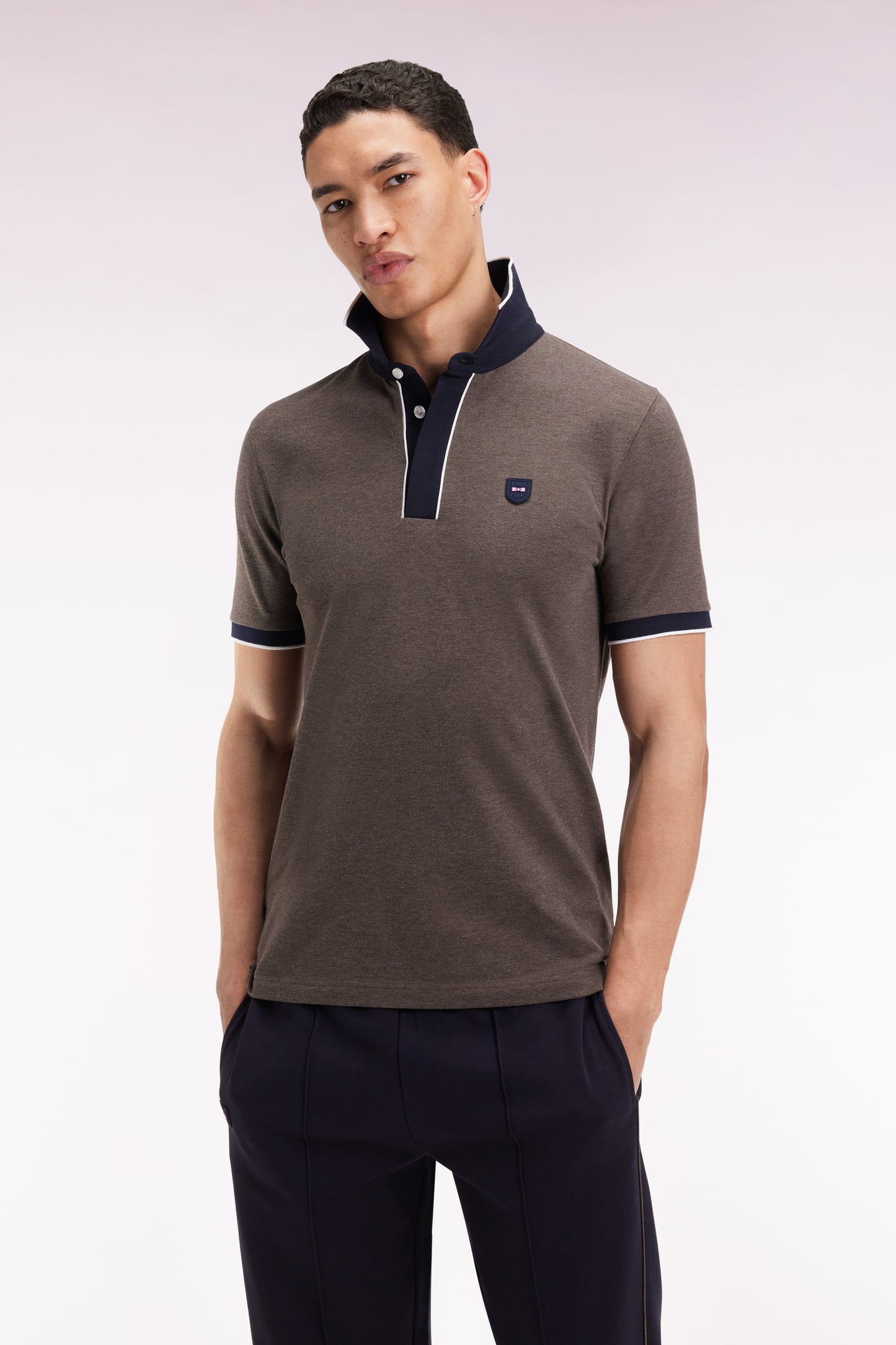 Short-sleeved polo shirt in brown stretch cotton piqué, slim fit