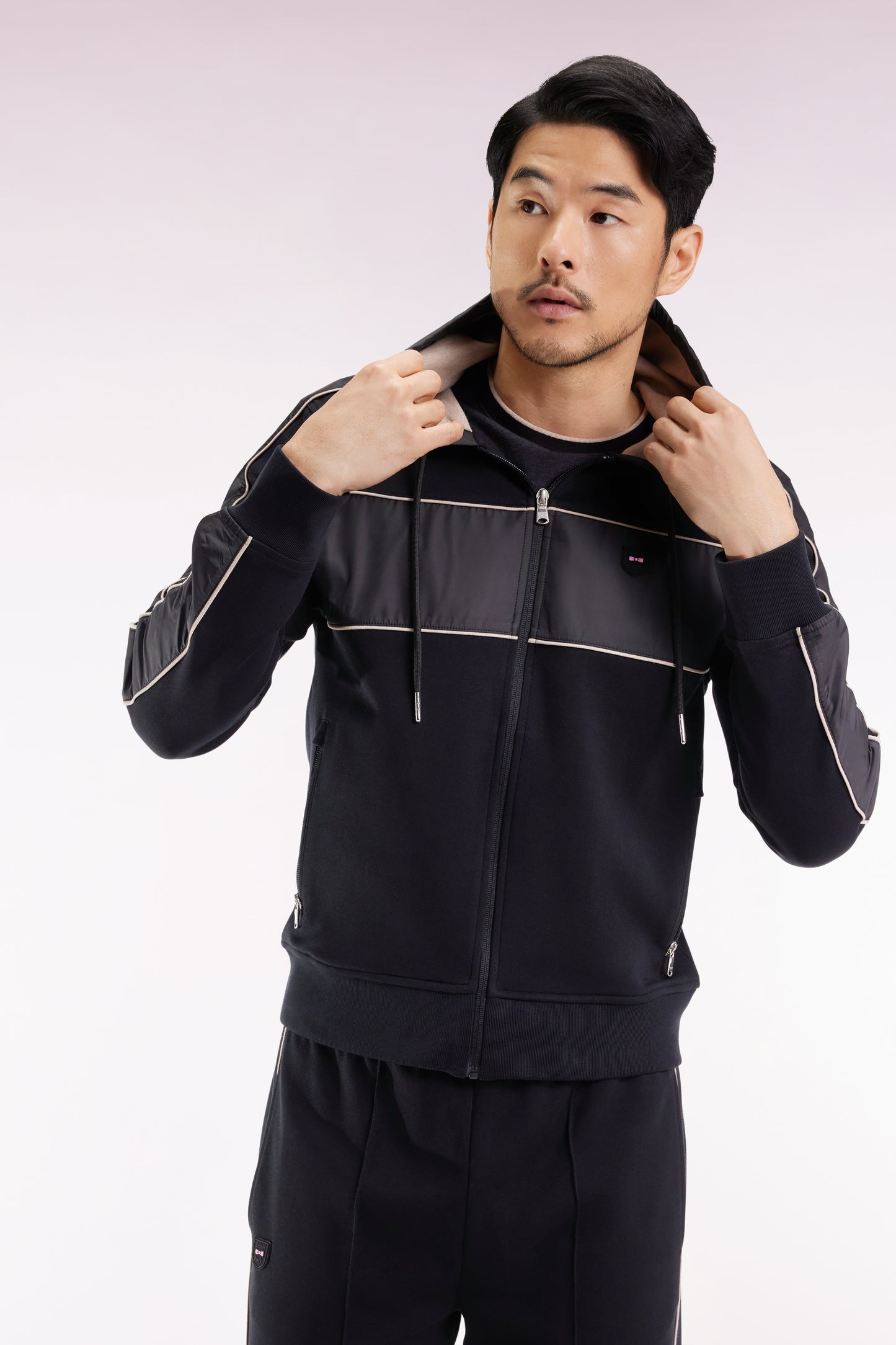 Sweatshirt zippé à capuche en molleton et nylon noir et beige