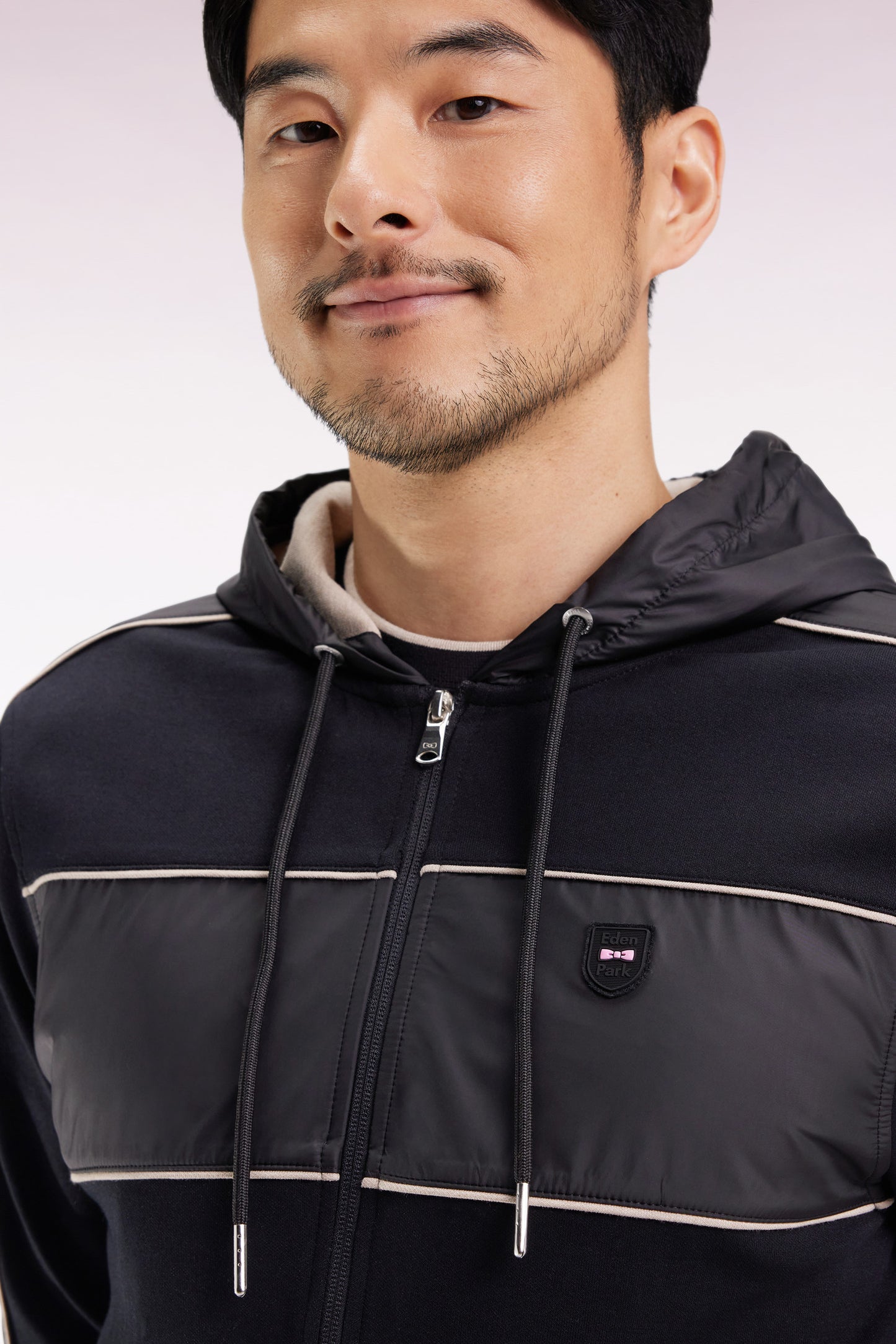 Sweatshirt zippé à capuche en molleton et nylon noir et beige