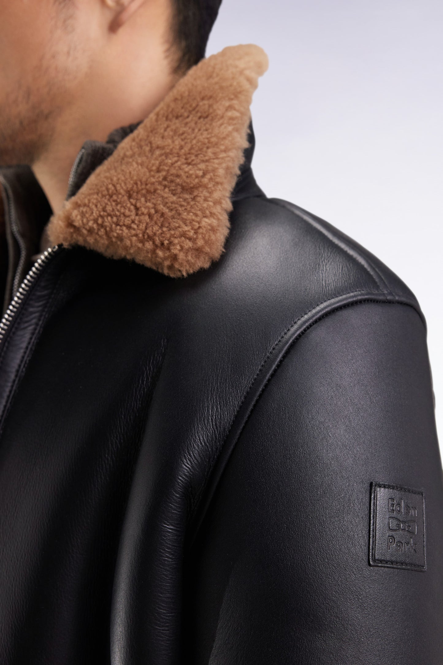 Black woolly jacket with brown collar