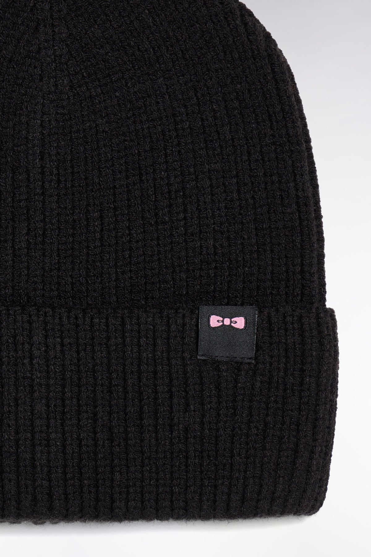 Black ribbed knit hat