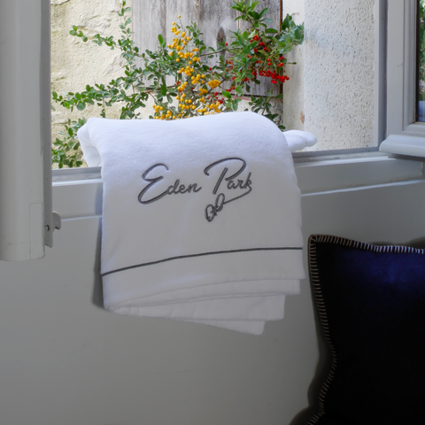 Large bath towel with grey embroidery - Image 1