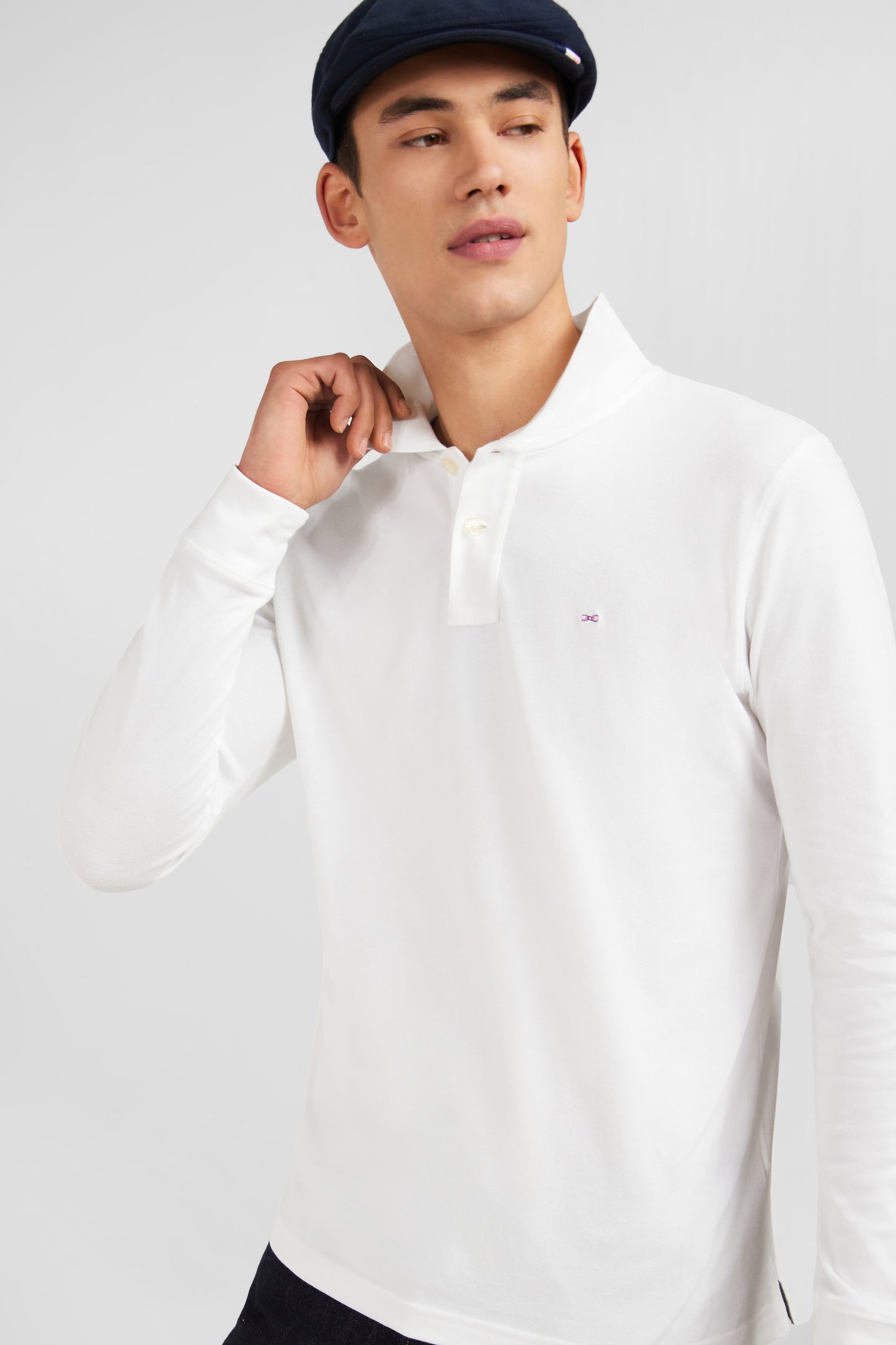 Polo manches longues blanc uni en piqué de coton stretch