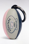 Porte-clefs ballon de rugby en cuir synthétique rose