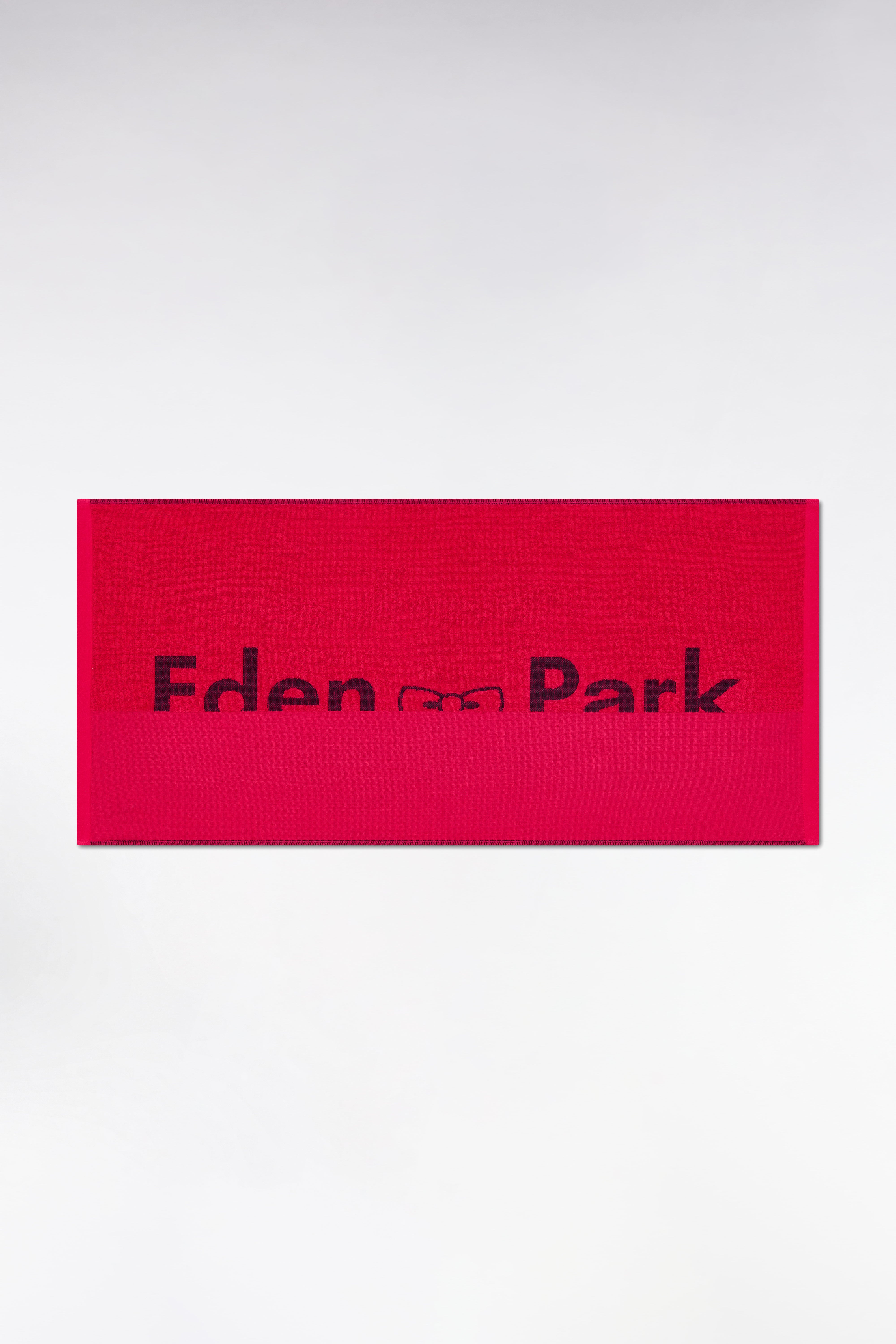 Drap de plage en coton éponge fuchsia jacquard Eden Park noir