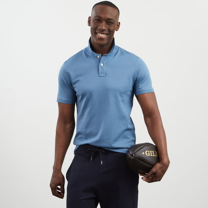 Polo bleu foncé manches courtes à logo brodé dos
