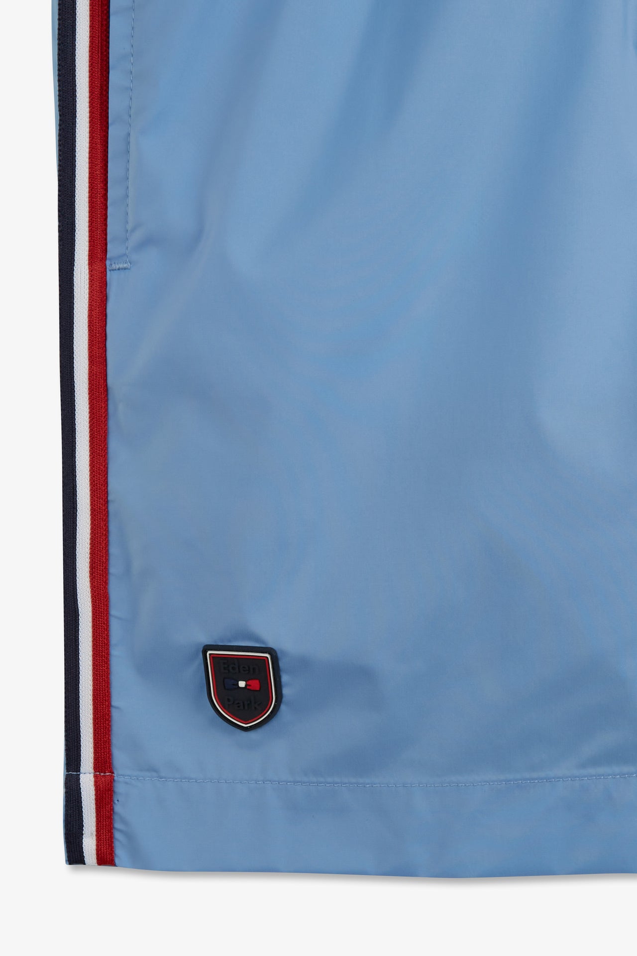 Short de bain uni détail bandes tricolores