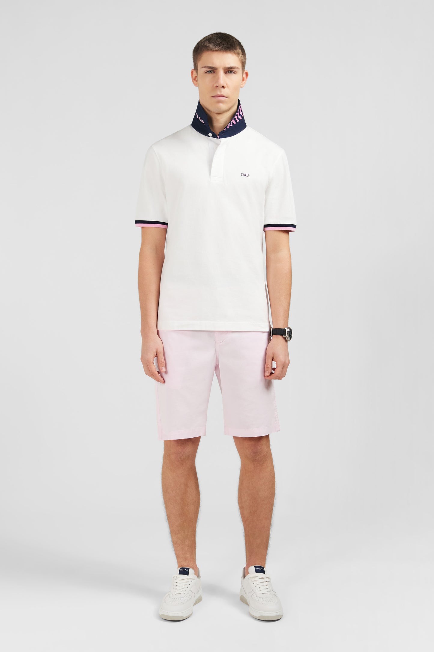 White rugby shirt with bow tie embroidery on back