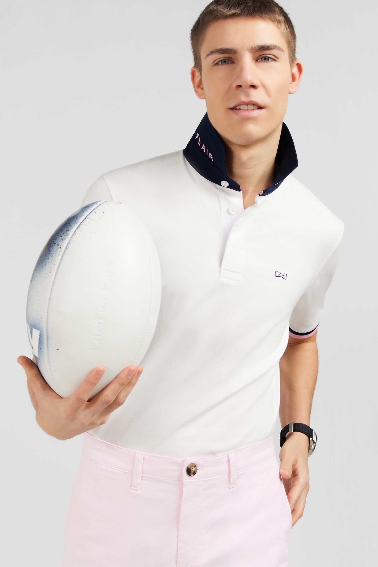 White rugby shirt with bow tie embroidery on back