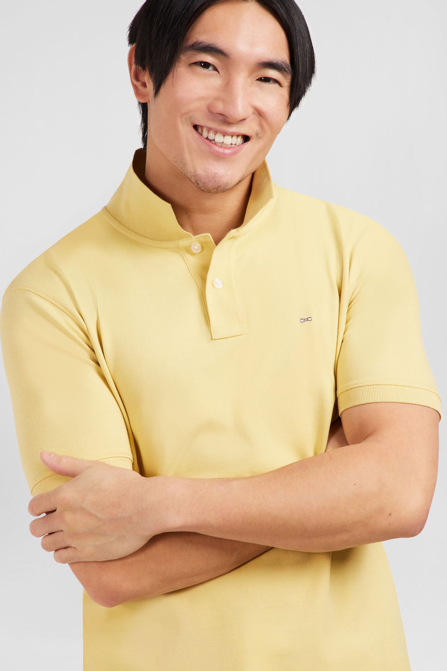 Plain yellow short-sleeved polo shirt