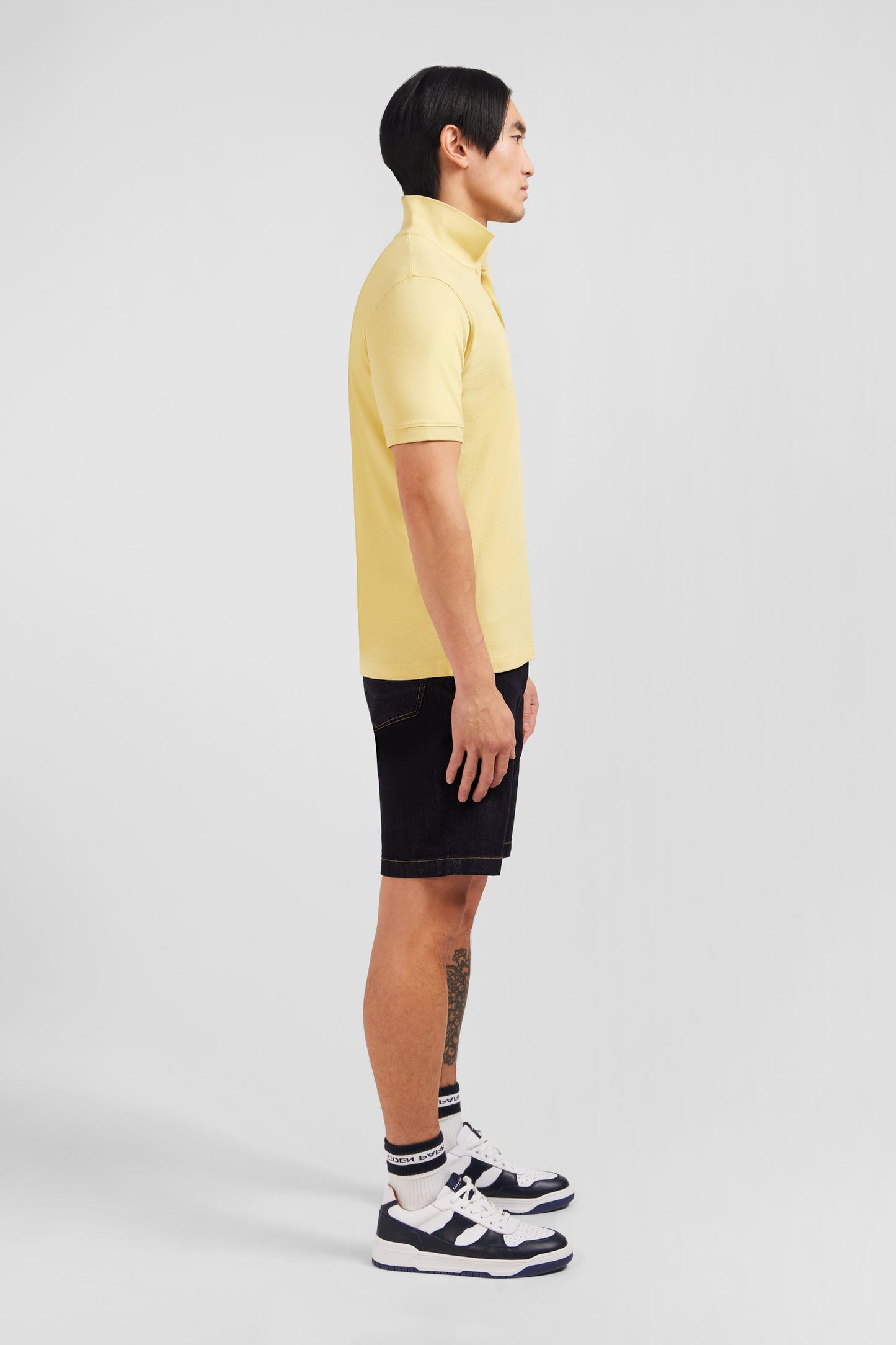 Plain yellow short-sleeved polo shirt