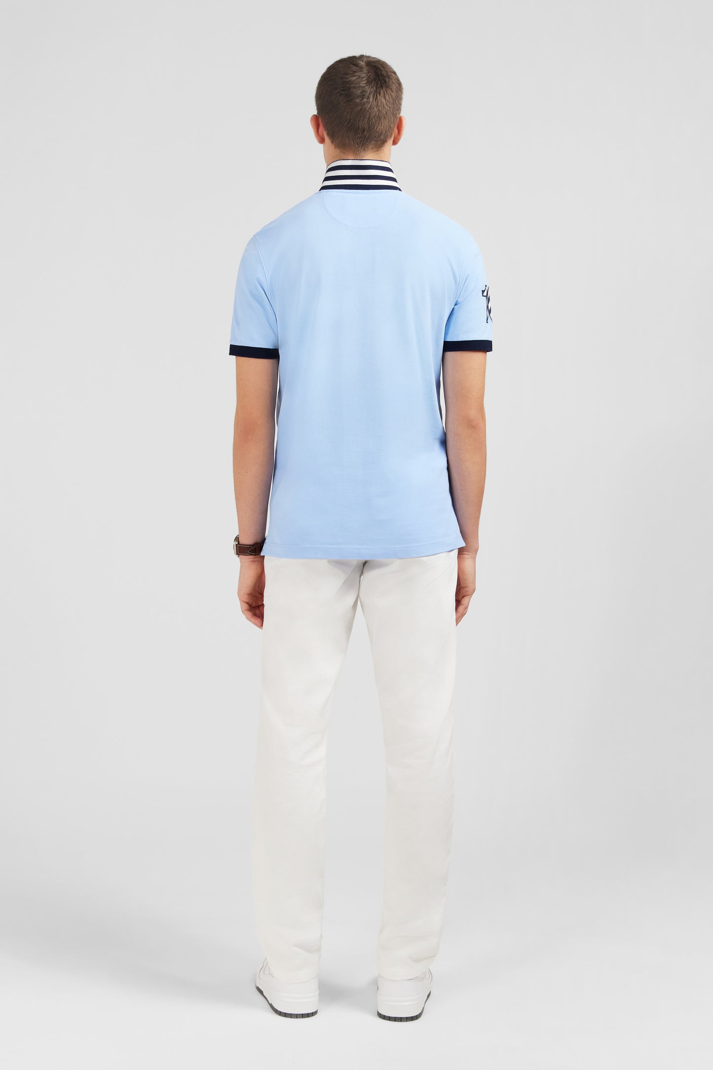Light blue short-sleeved polo shirt number 10