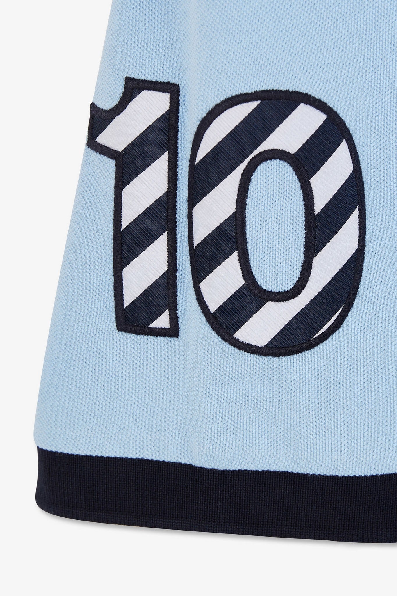 Light blue short-sleeved polo shirt number 10