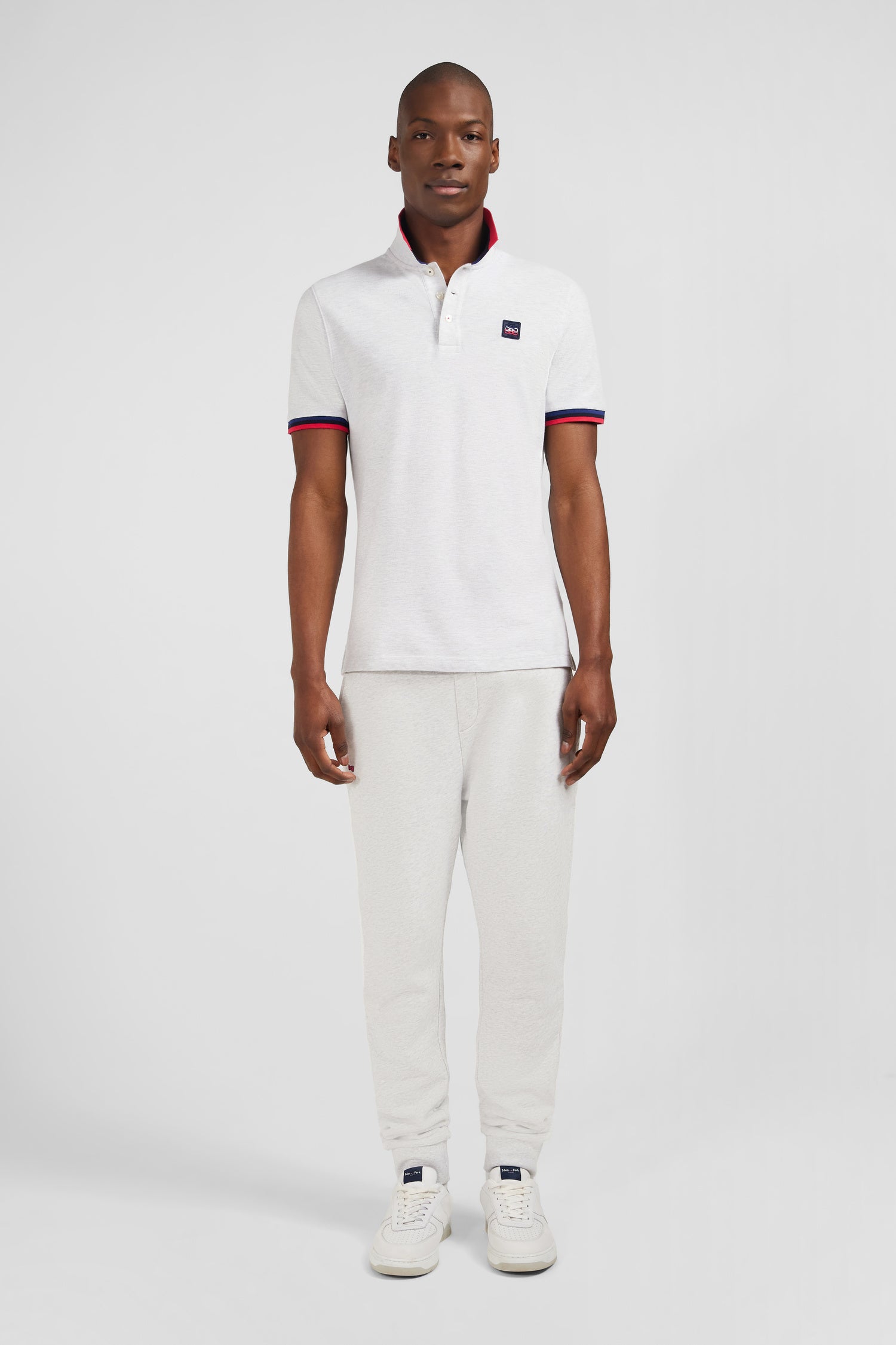 Polo gris à détails tricolores