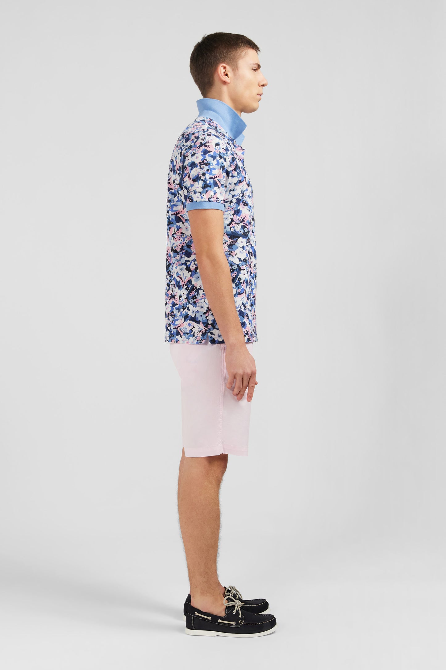 Light blue short-sleeved polo shirt with flower print