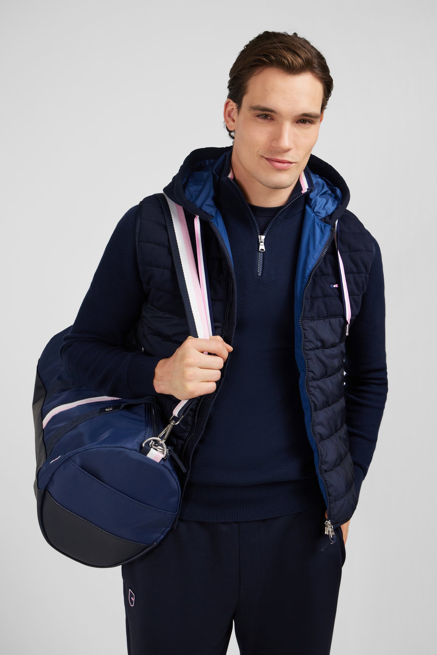 Navy blue sleeveless hooded puffa jacket