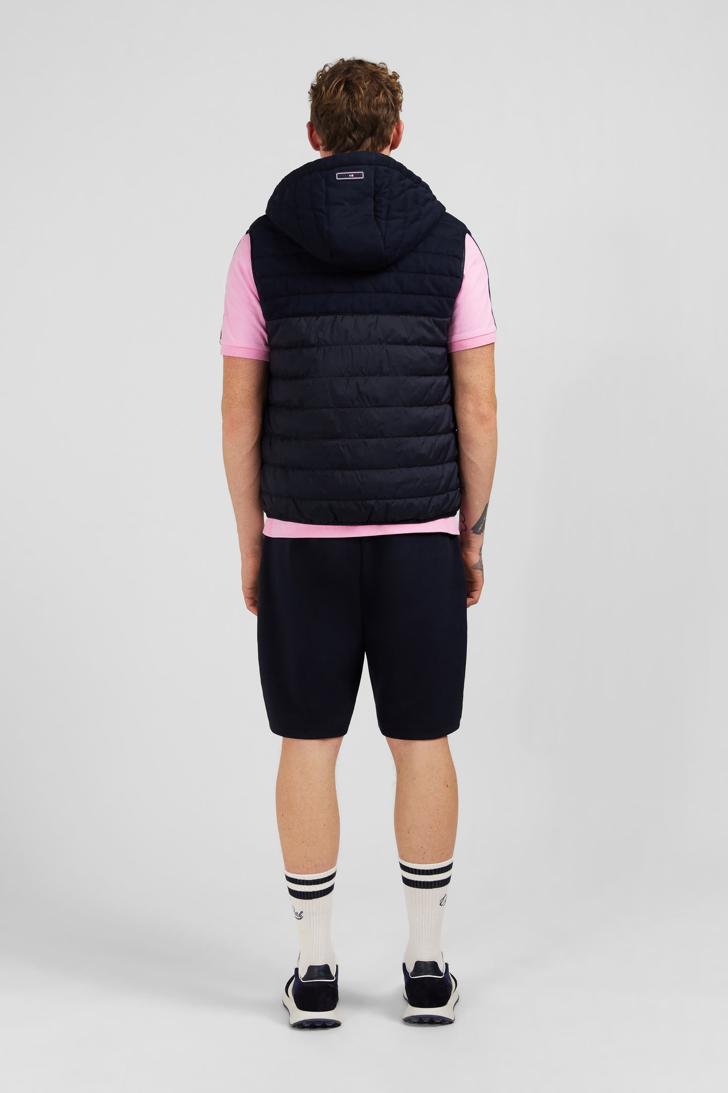 Navy blue sleeveless hooded puffa jacket