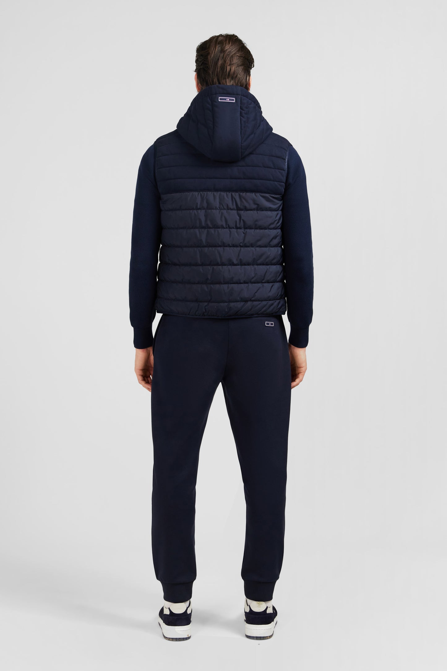 Navy blue sleeveless hooded puffa jacket