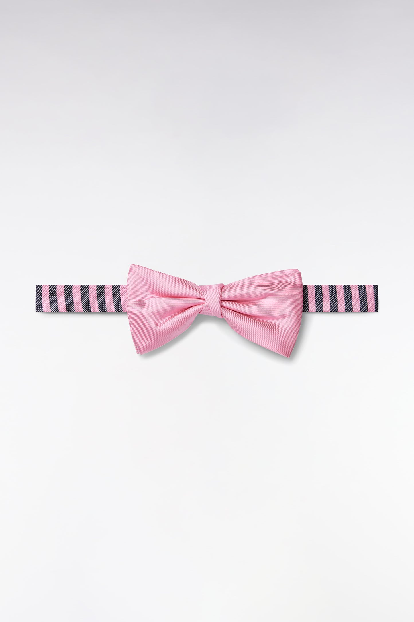 Pink silk bow tie with striped-necked neckline