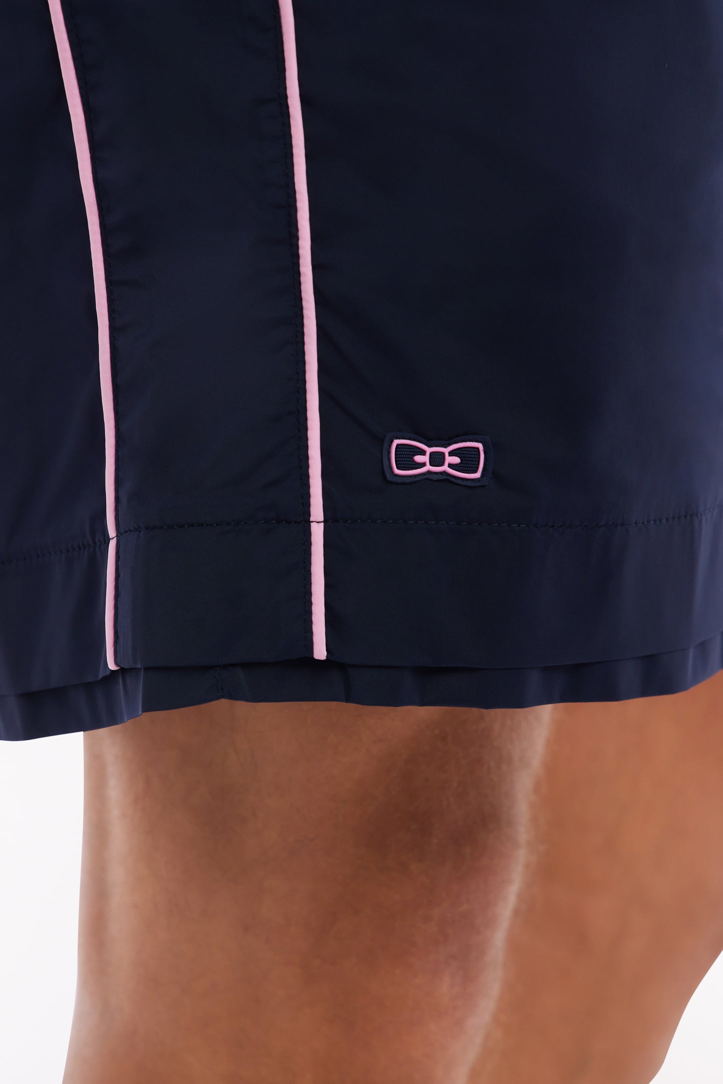 Navy swimsuit with pink piping