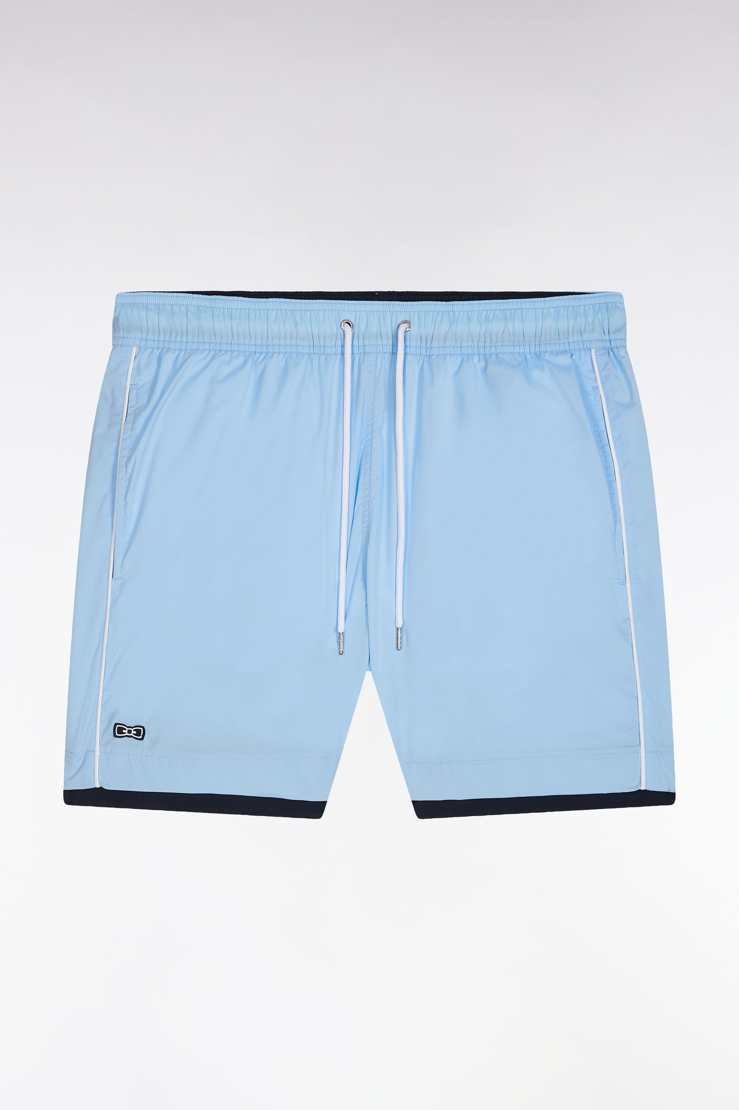Sky blue swimsuit with white piping