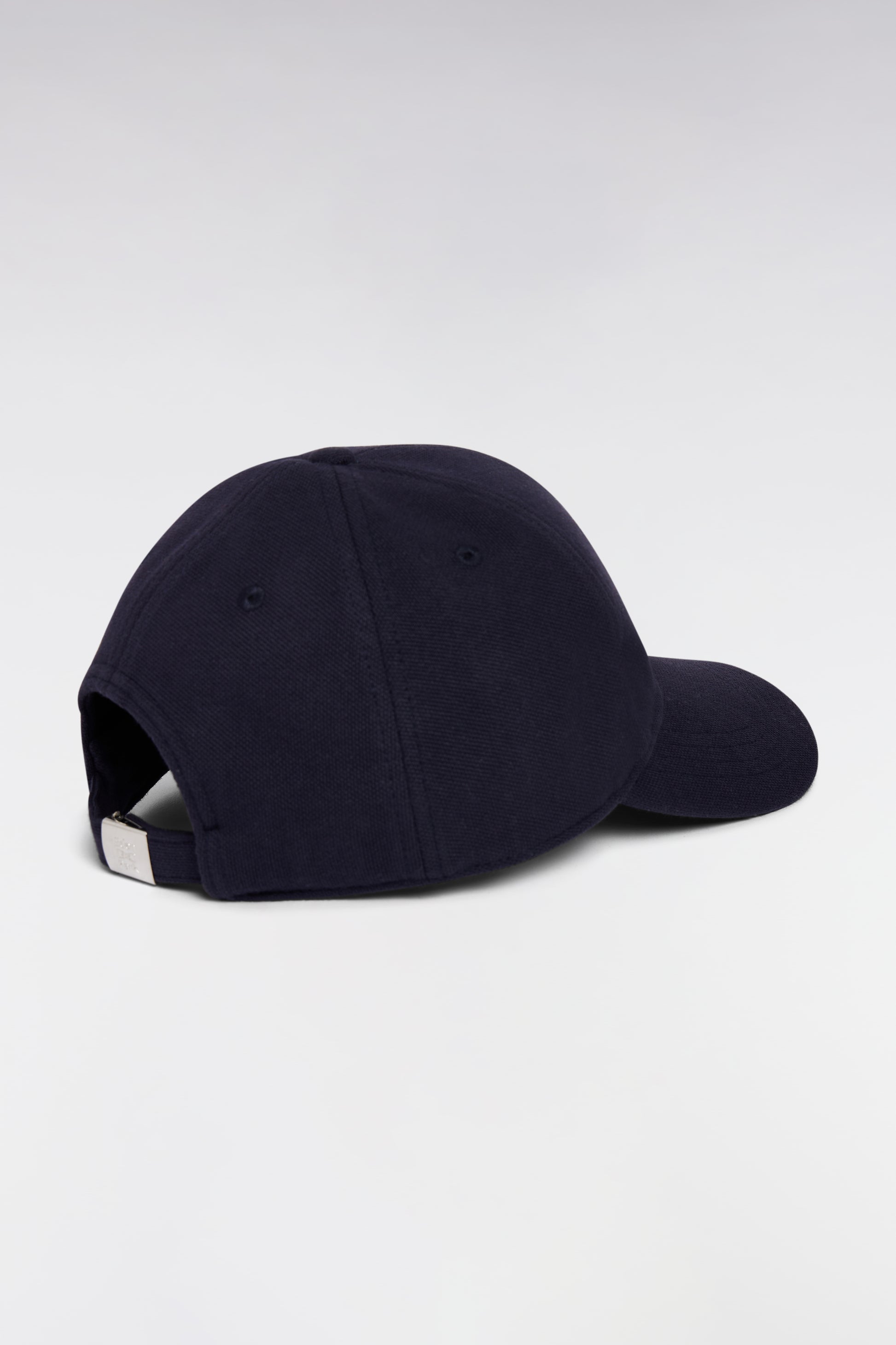 Casquette unie en piqué coton marine broderie nœud papillon