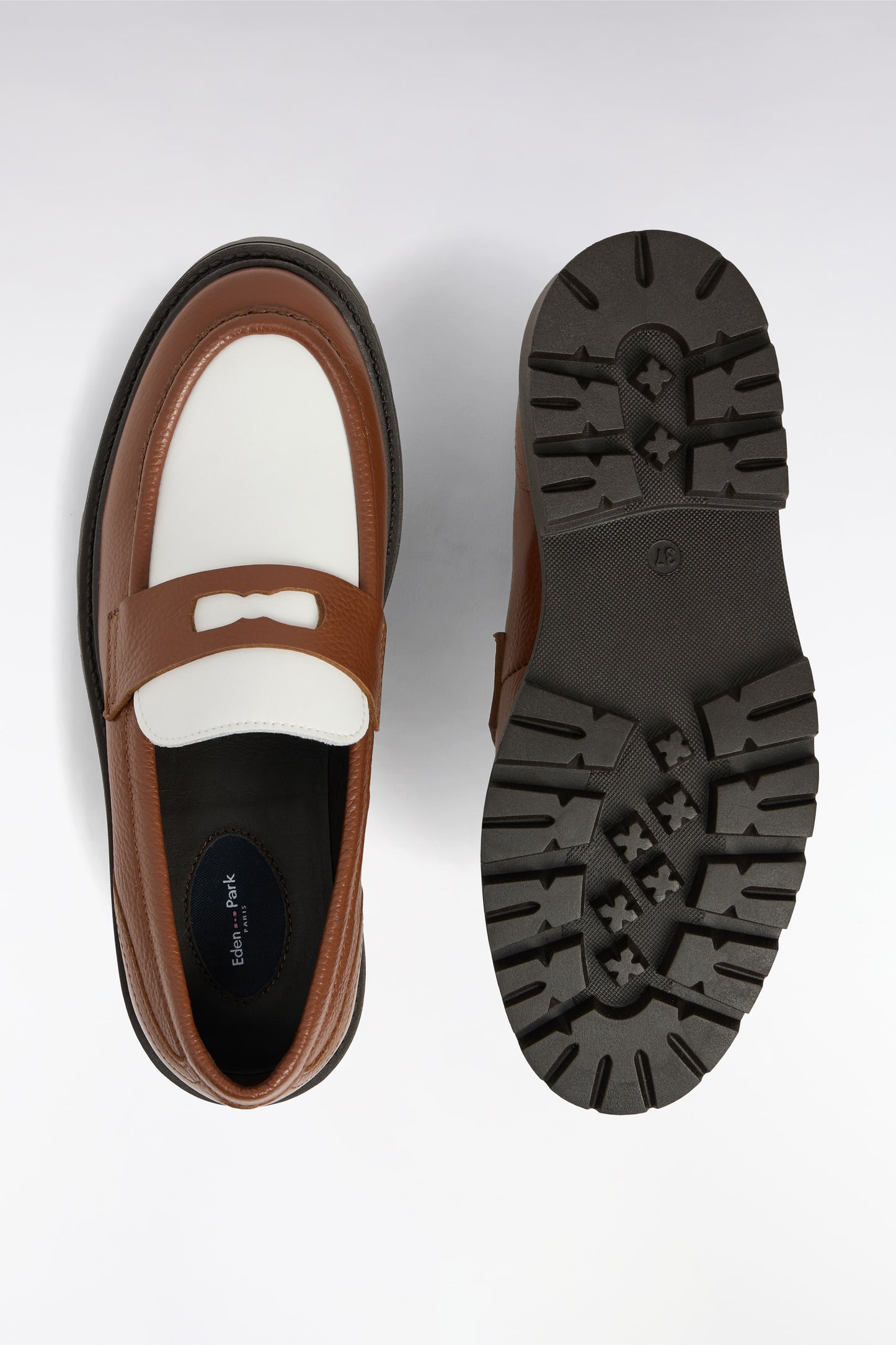 Two-tone brown and white leather loafers