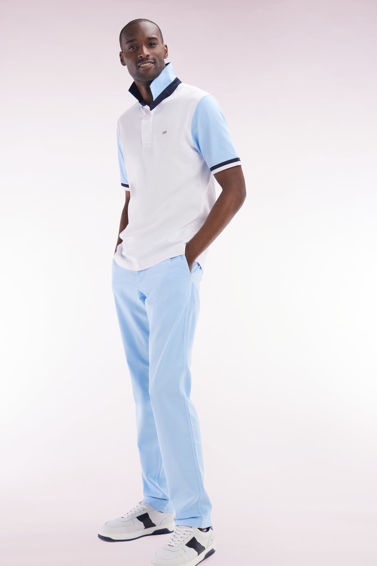 Straight-cut short-sleeved rugby shirt in sky blue cotton jersey with bow tie embroidery