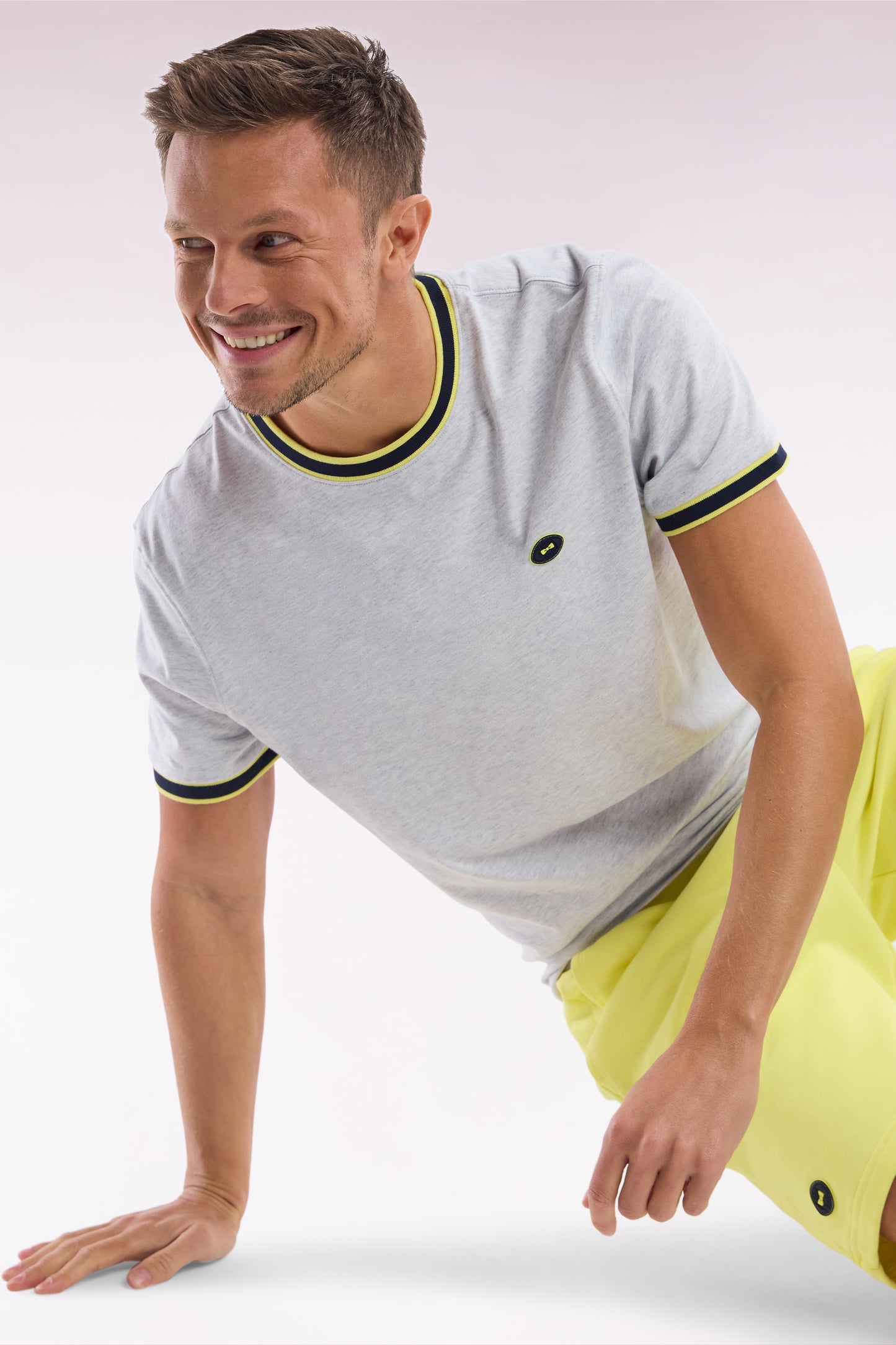 Grey cotton T-shirt with green ribbing, relaxed fit